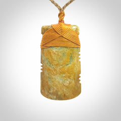 This is a lovely medium sized notched toki pendant made from a gorgeous New Zealand Flower Jade.