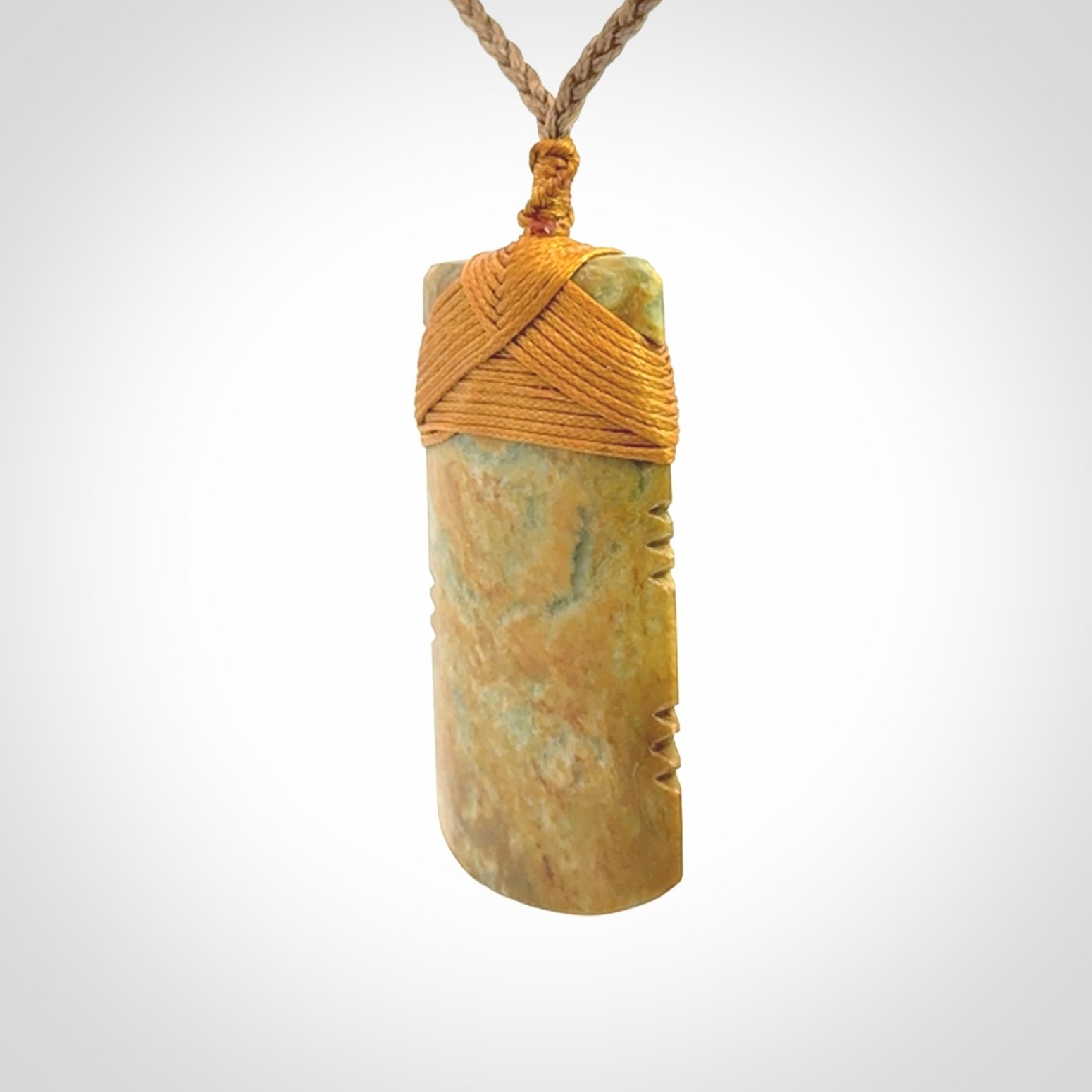 This is a lovely medium sized notched toki pendant made from a gorgeous New Zealand Flower Jade.