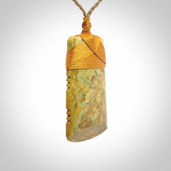 This is a lovely medium sized notched toki pendant made from a gorgeous New Zealand Flower Jade.