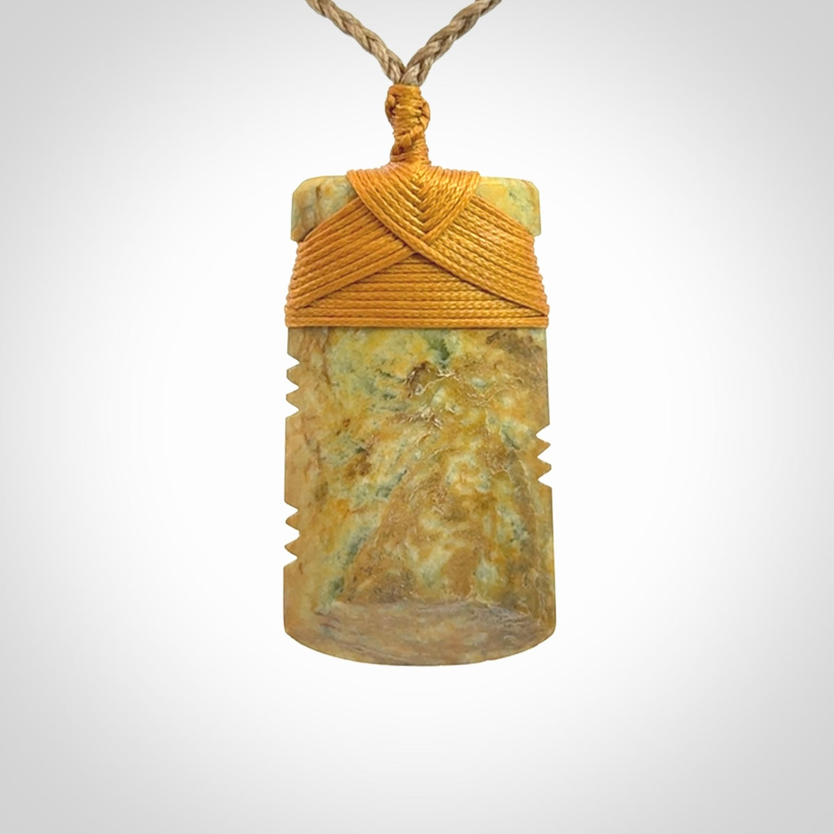 This is a lovely medium sized notched toki pendant made from a gorgeous New Zealand Flower Jade.