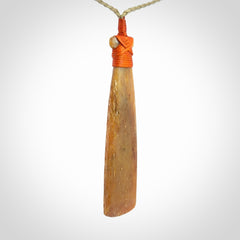 A Striking Whale Bone Toki Pendant