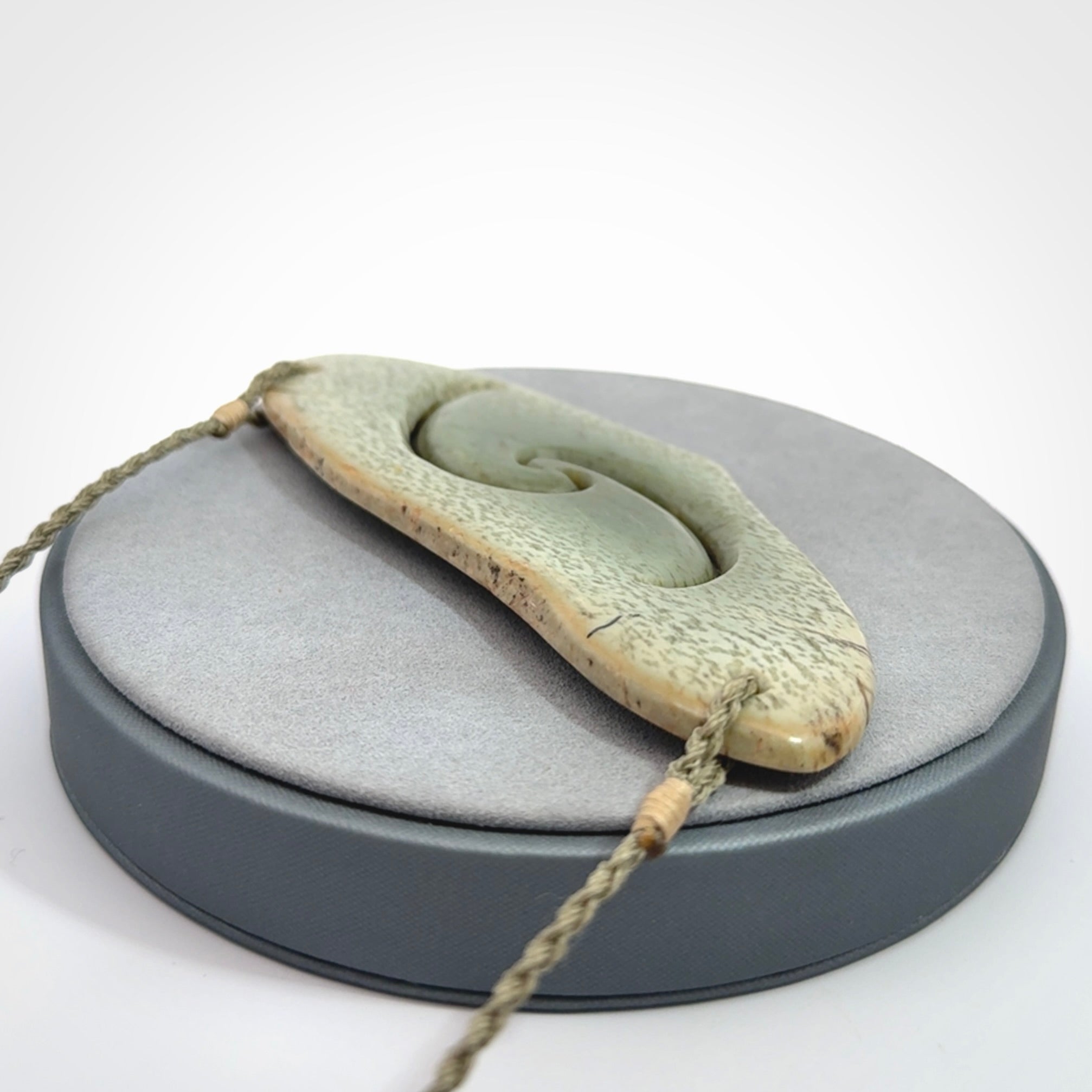 Hand carved whale tail pendant in New Zealand Jade