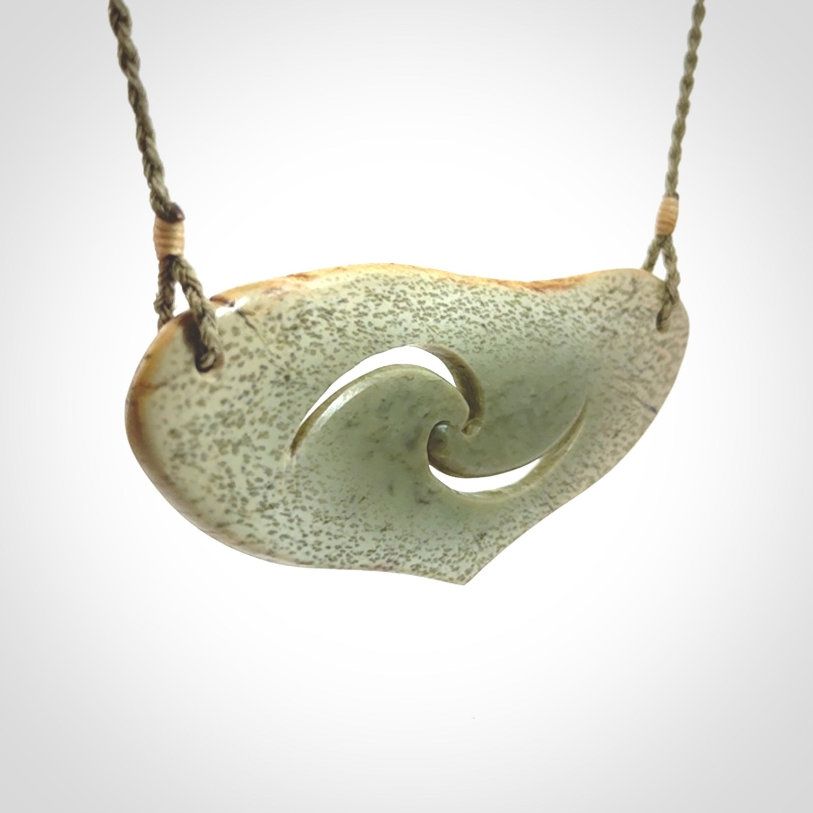 Hand carved whale tail pendant in New Zealand Jade