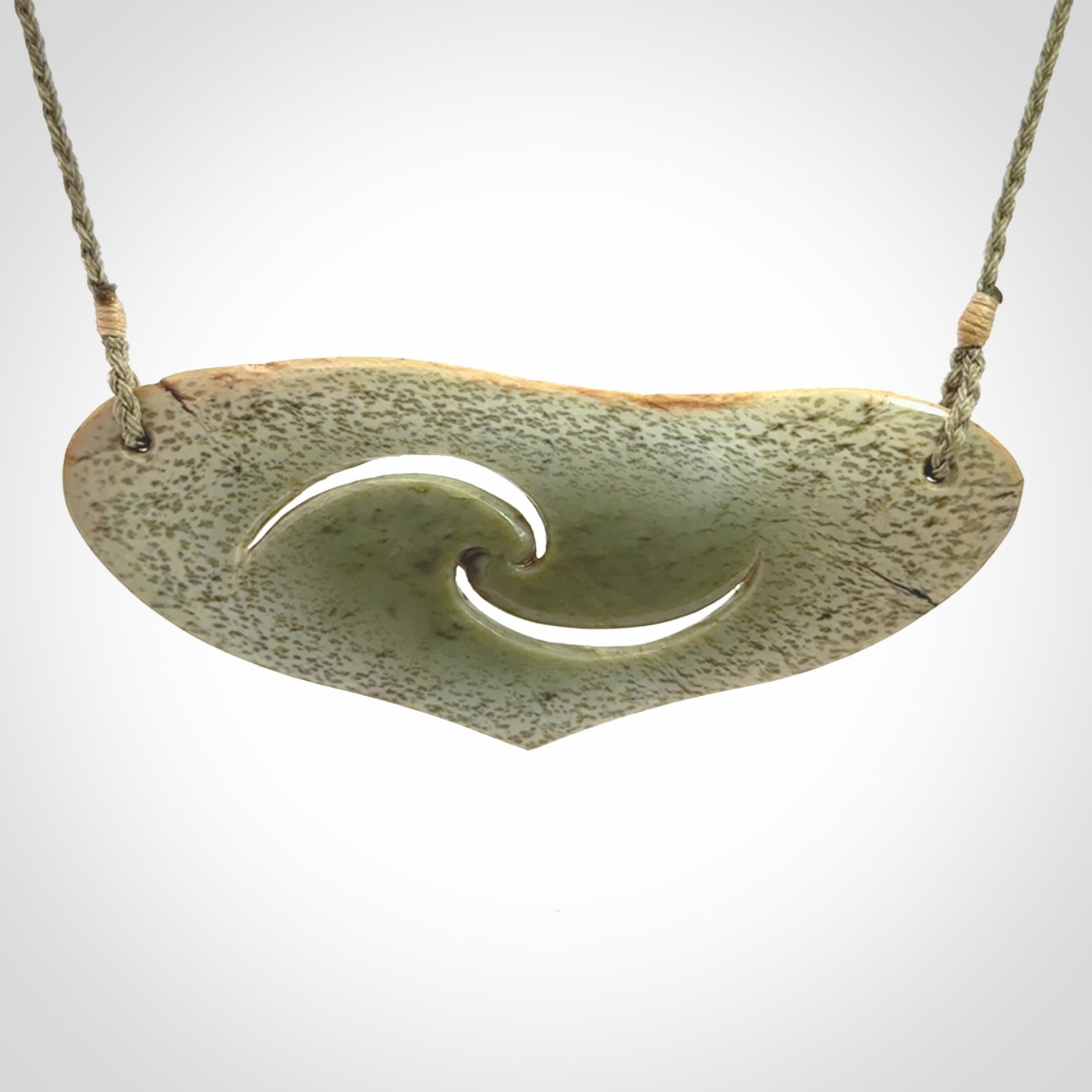 Hand carved whale tail pendant in New Zealand Jade