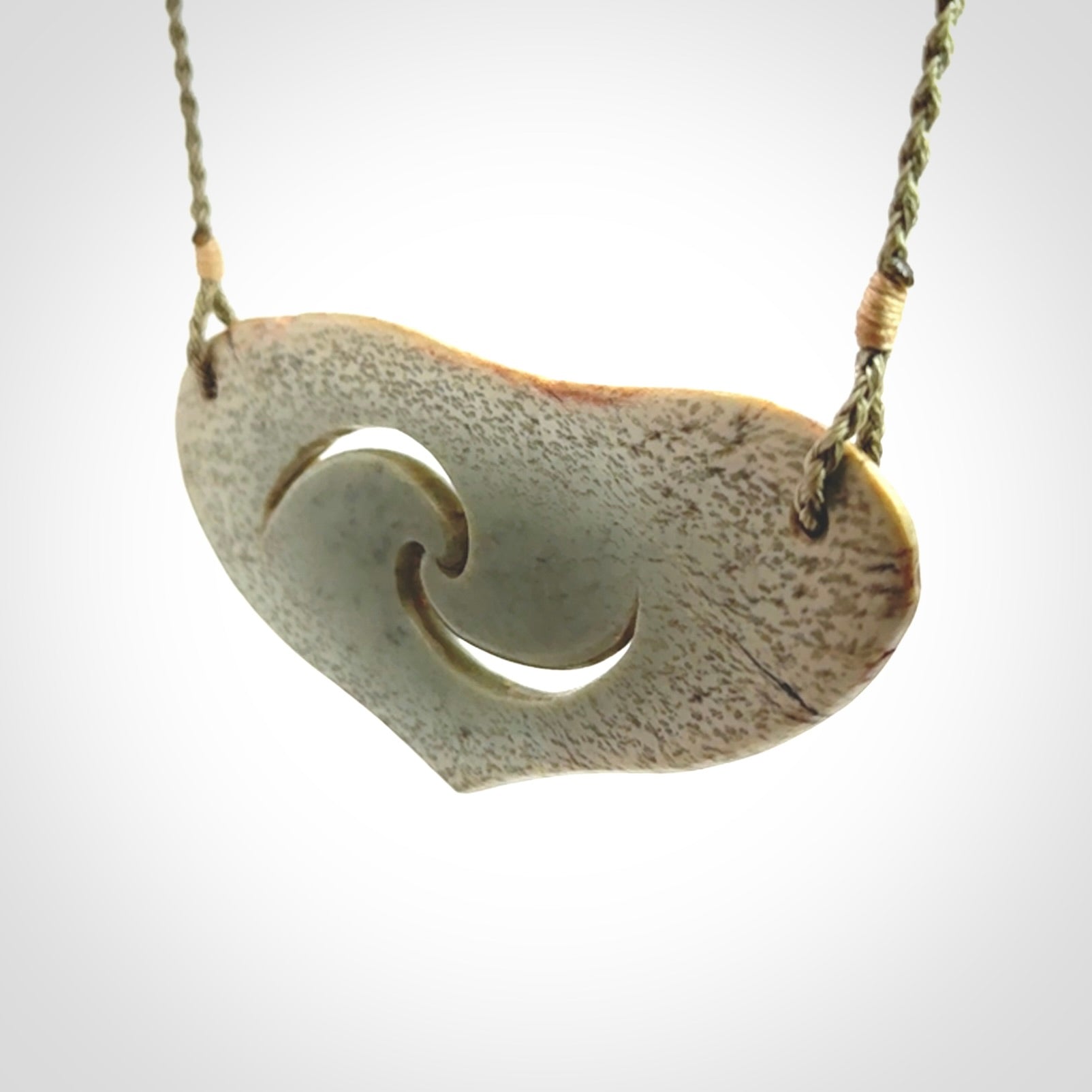 Hand carved whale tail pendant in New Zealand Jade
