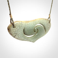 Hand carved whale tail pendant in New Zealand Jade