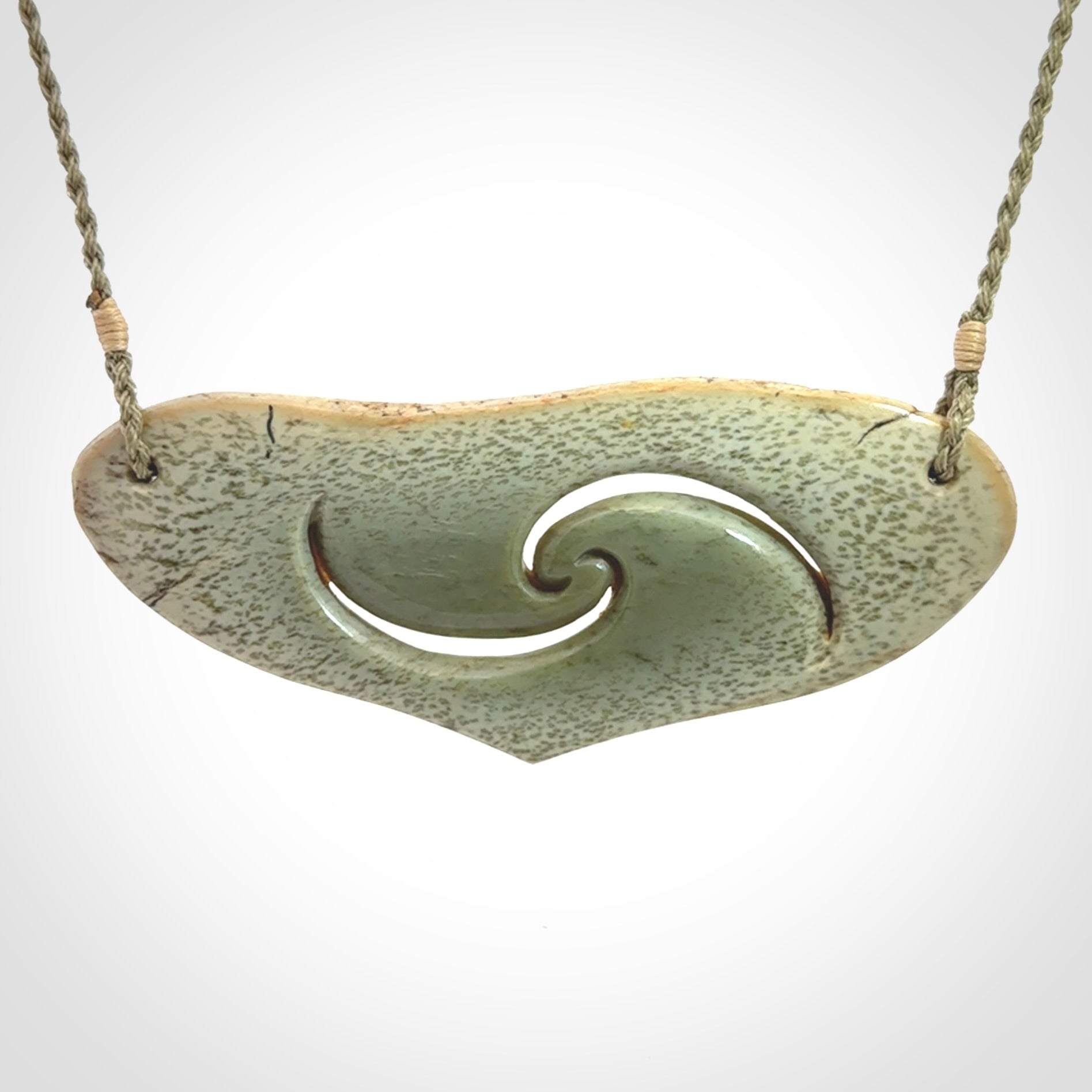 Hand carved whale tail pendant in New Zealand Jade