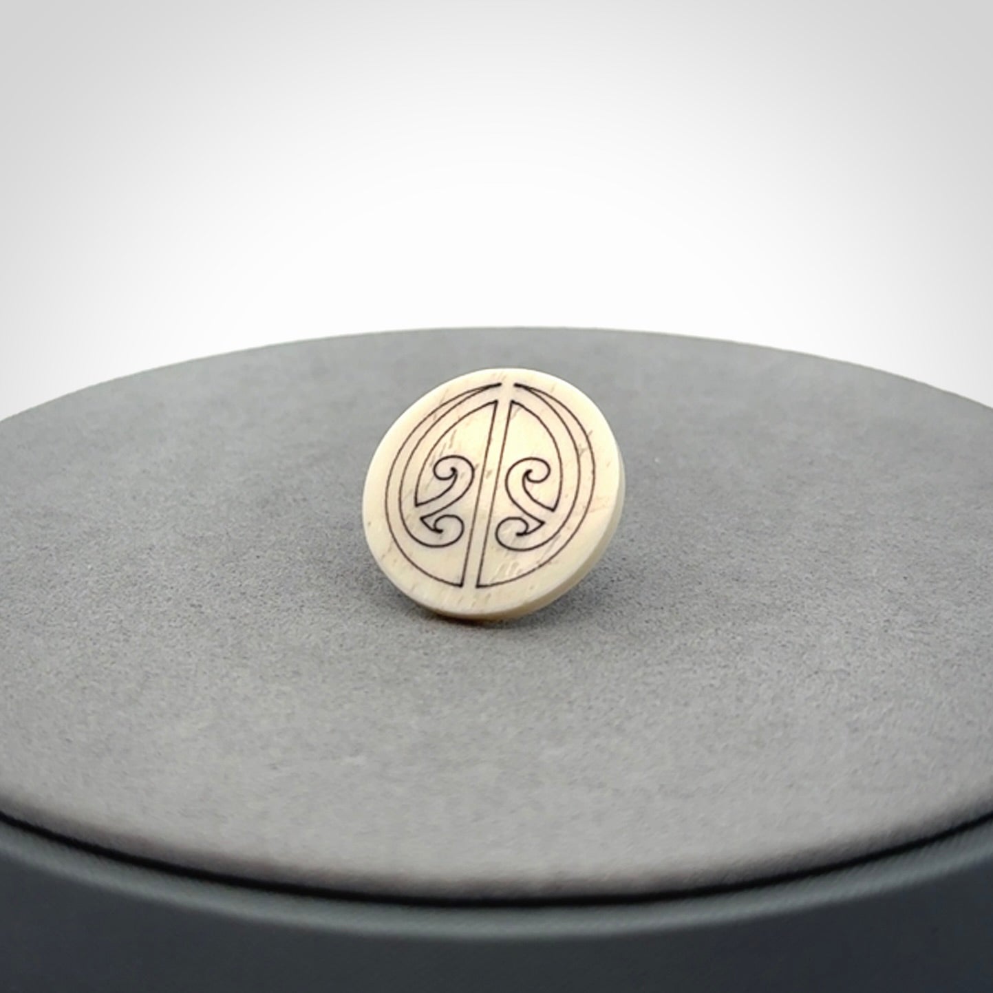 Bone lapel pin