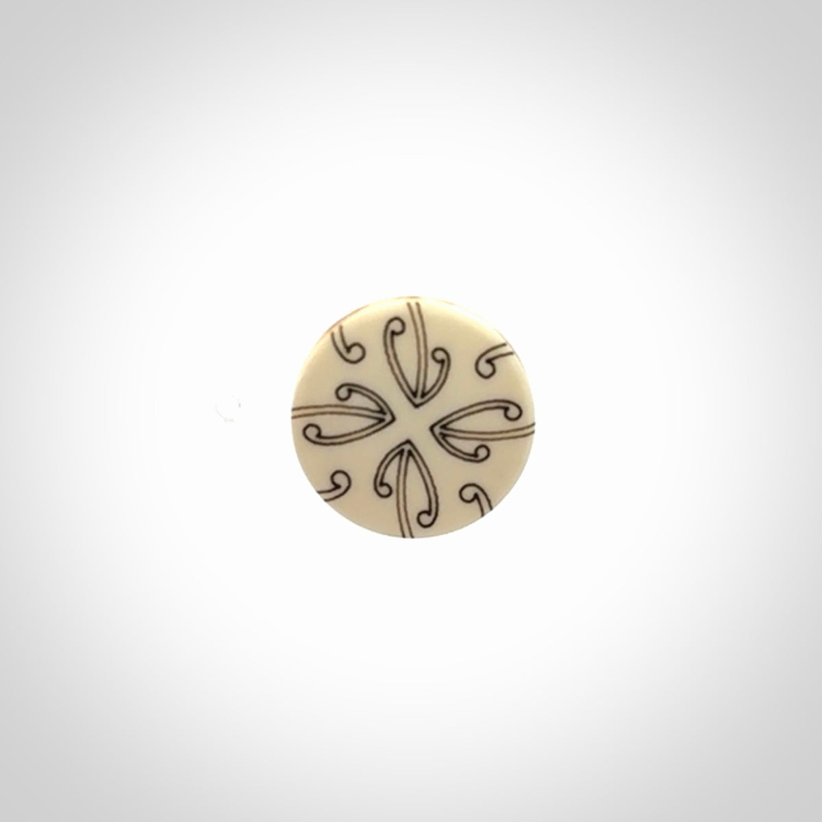 An eye-catching bone lapel pin