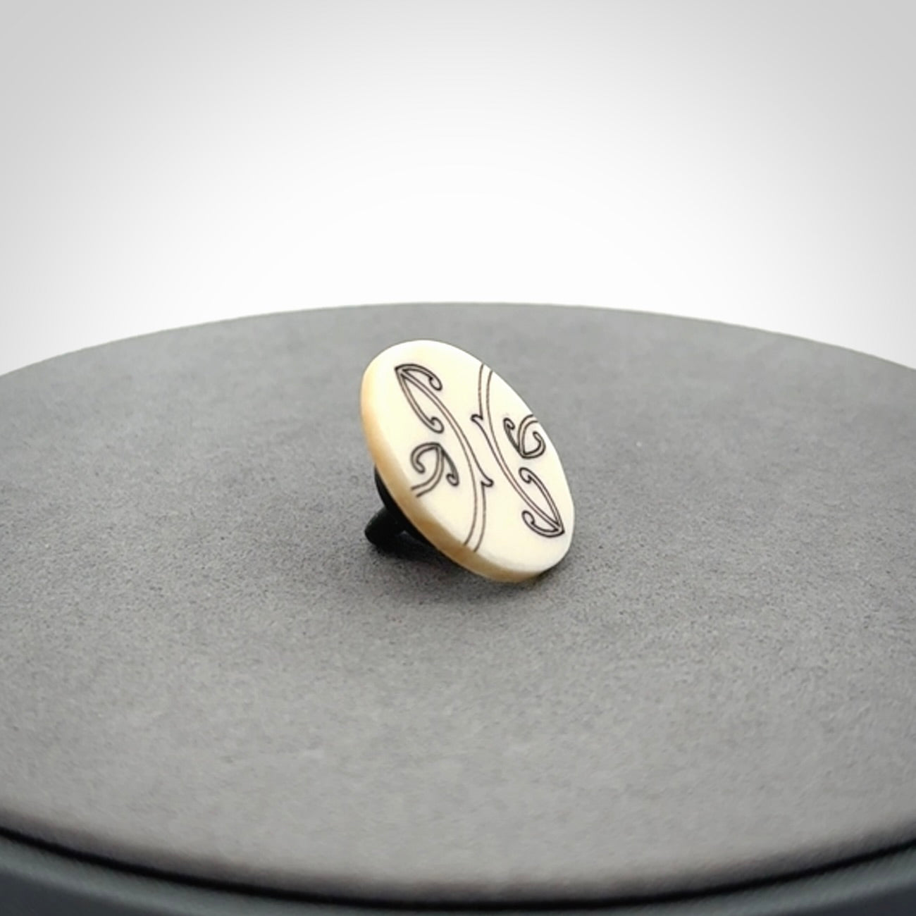 Bone lapel pin