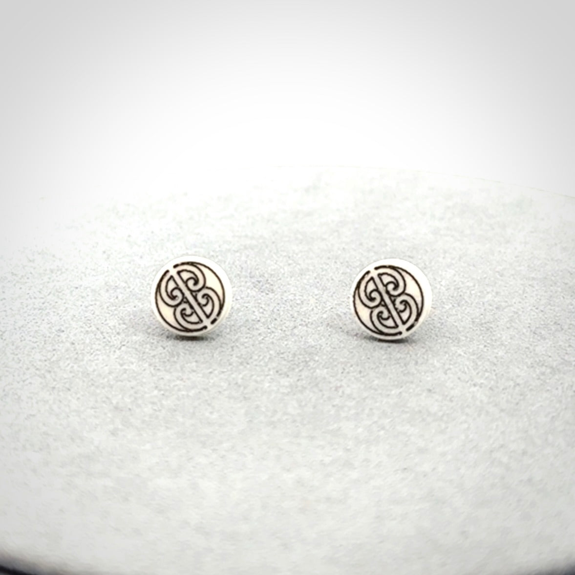 These are beautiful, small, bone stud earrings