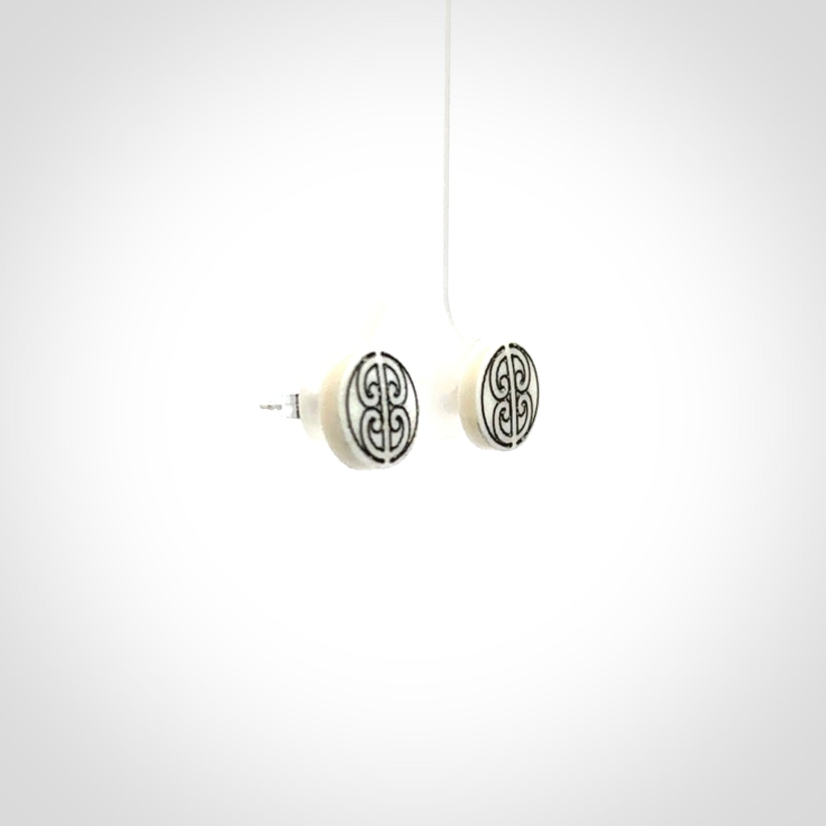 These are beautiful, small, bone stud earrings