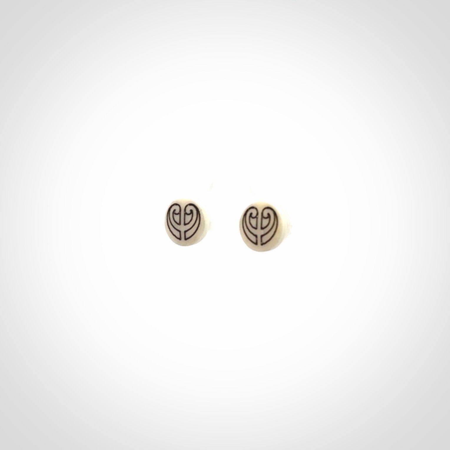 These are beautiful stud earrings, hand made in bone