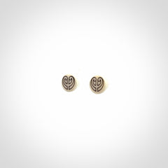 These are beautiful stud earrings, hand made in bone