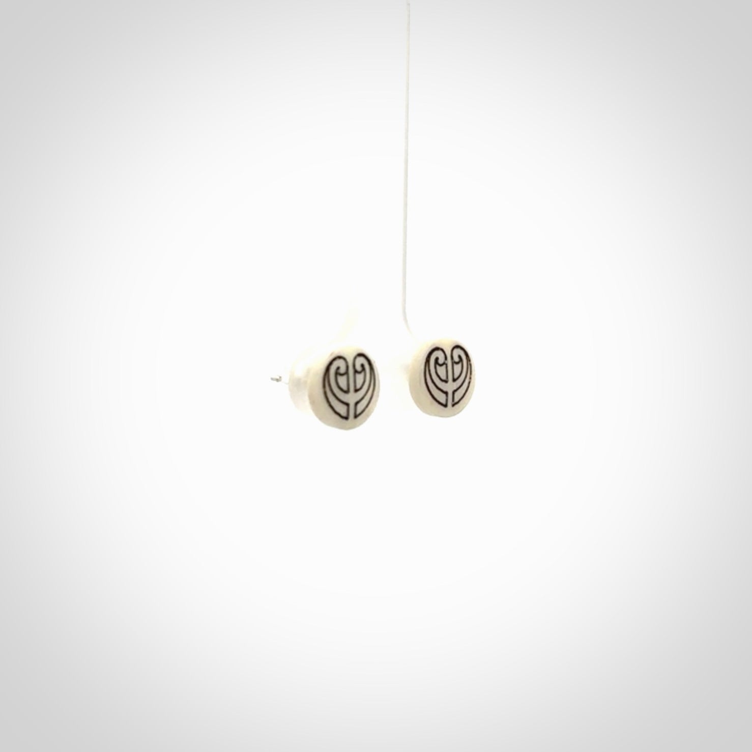 These are beautiful stud earrings, hand made in bone