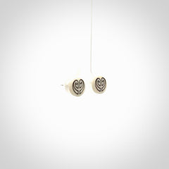 These are beautiful stud earrings, hand made in bone
