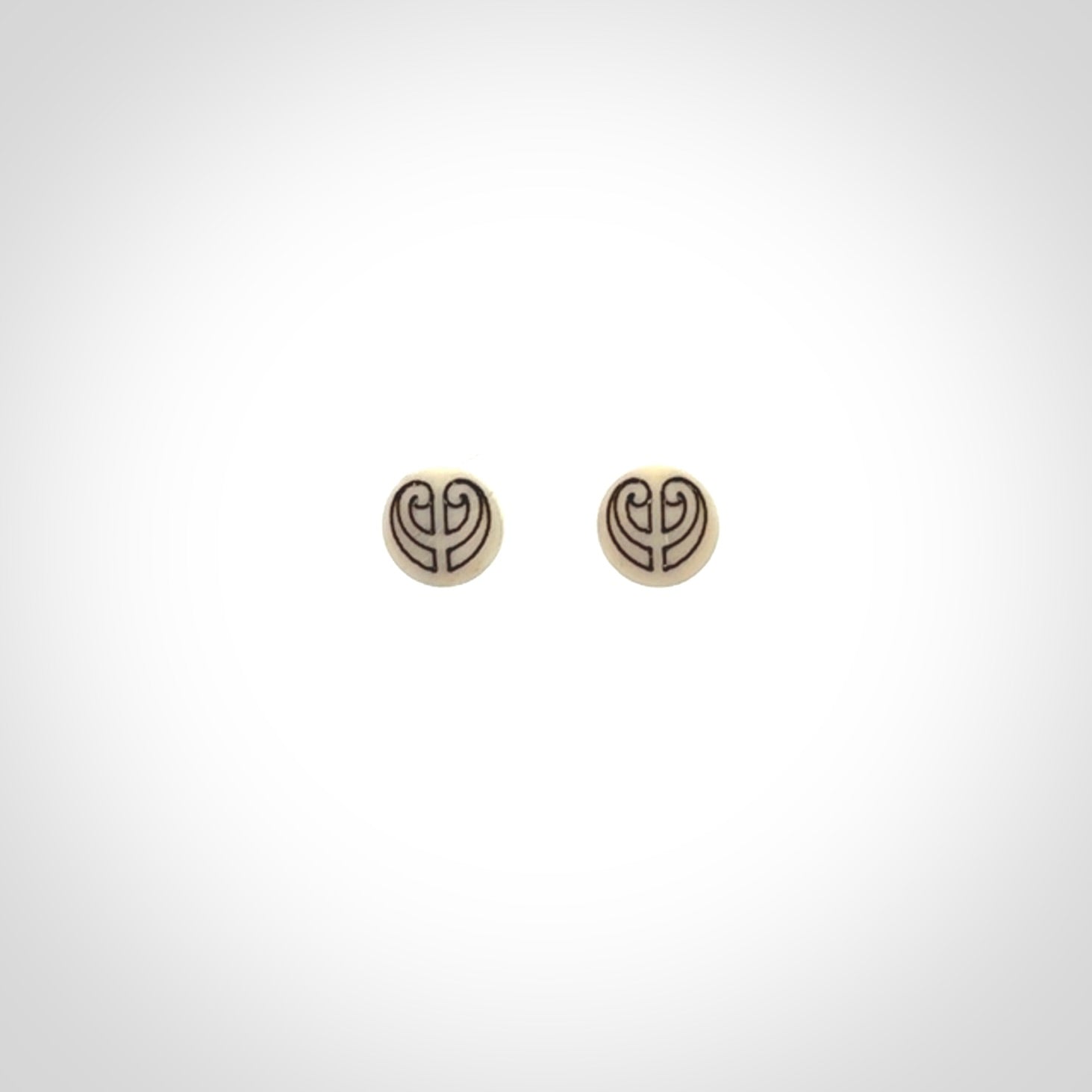 These are beautiful stud earrings, hand made in bone