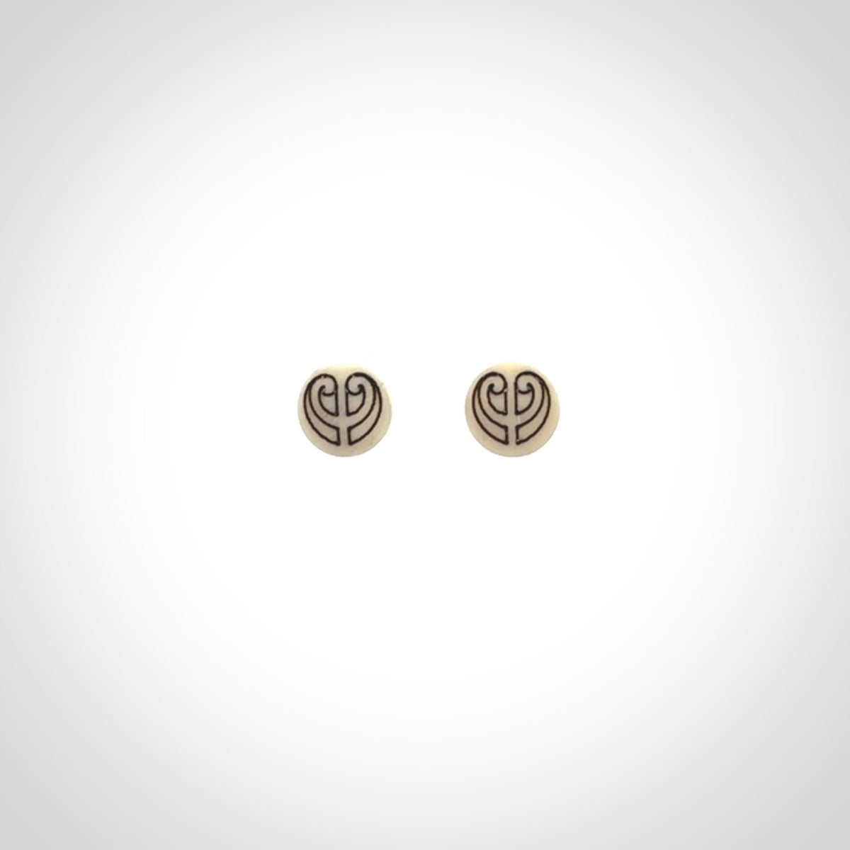 These are beautiful stud earrings, hand made in bone