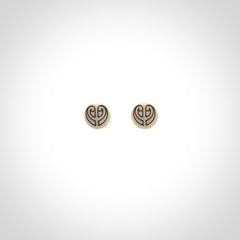 These are beautiful stud earrings, hand made in bone