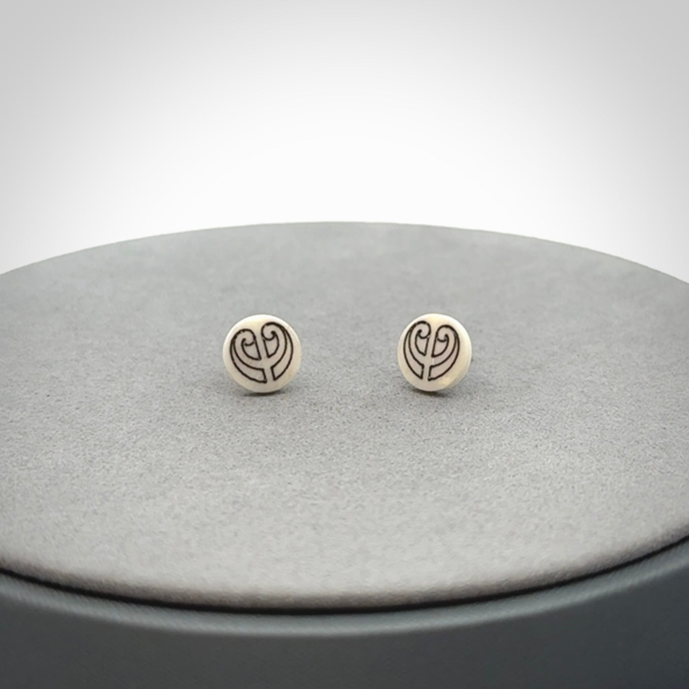 These are beautiful stud earrings, hand made in bone
