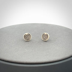These are beautiful stud earrings, hand made in bone