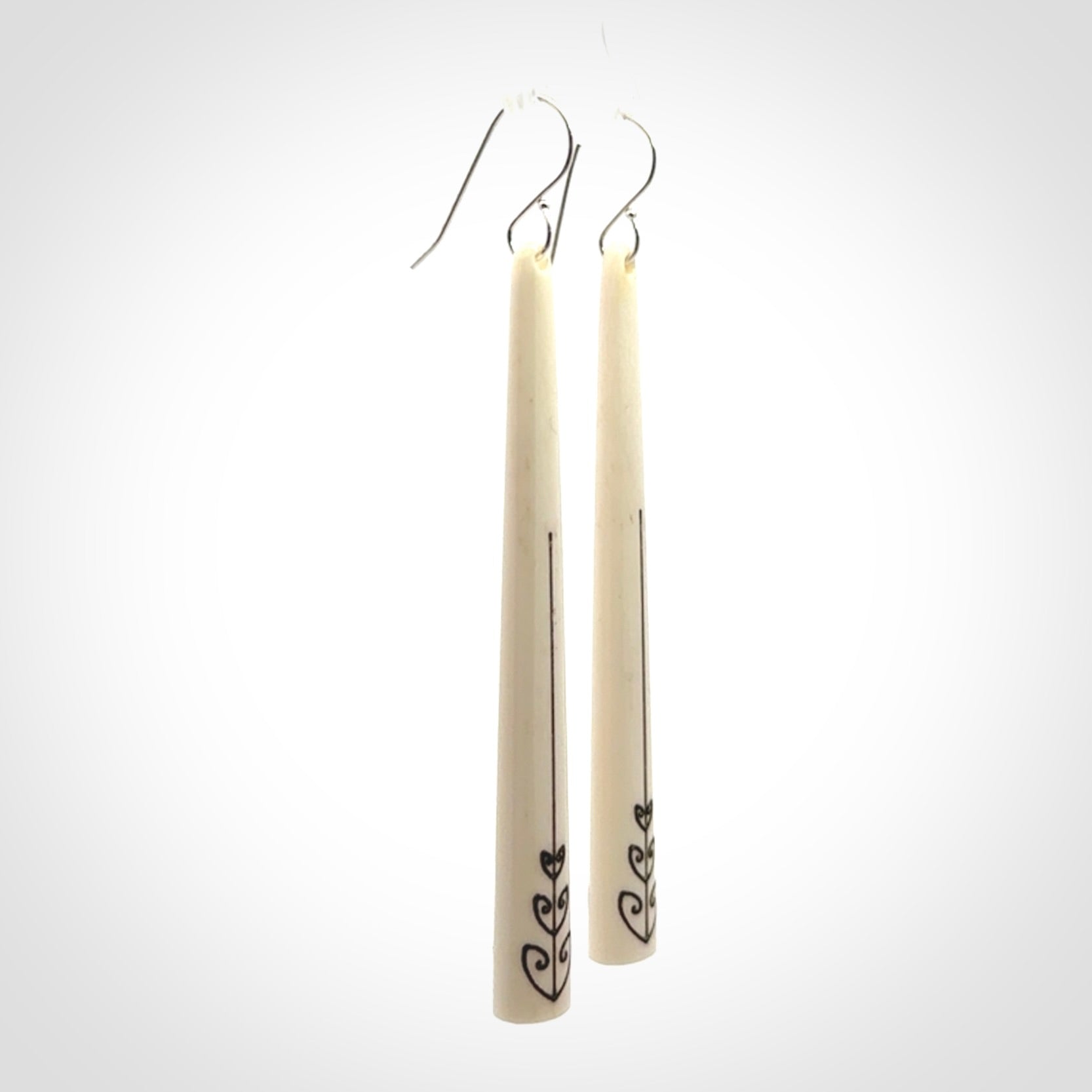 Hand carved bone earrings
