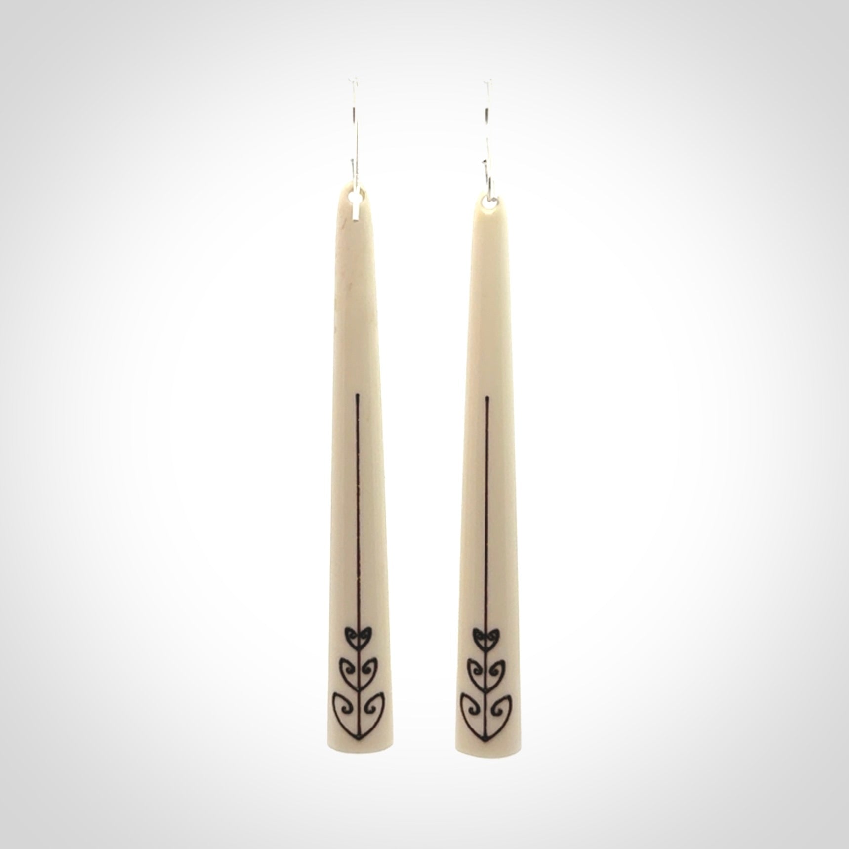 Hand carved bone earrings