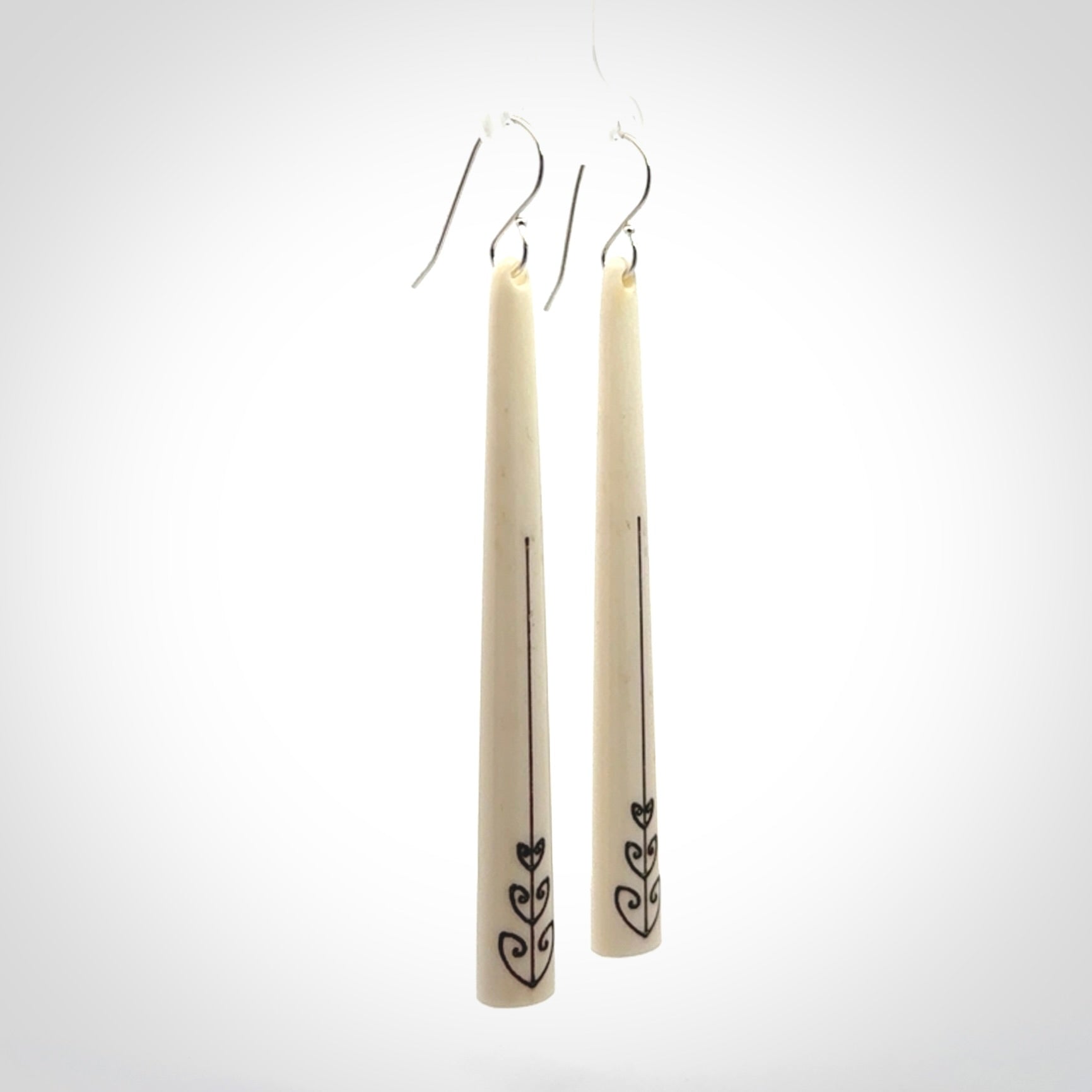 Hand carved bone earrings