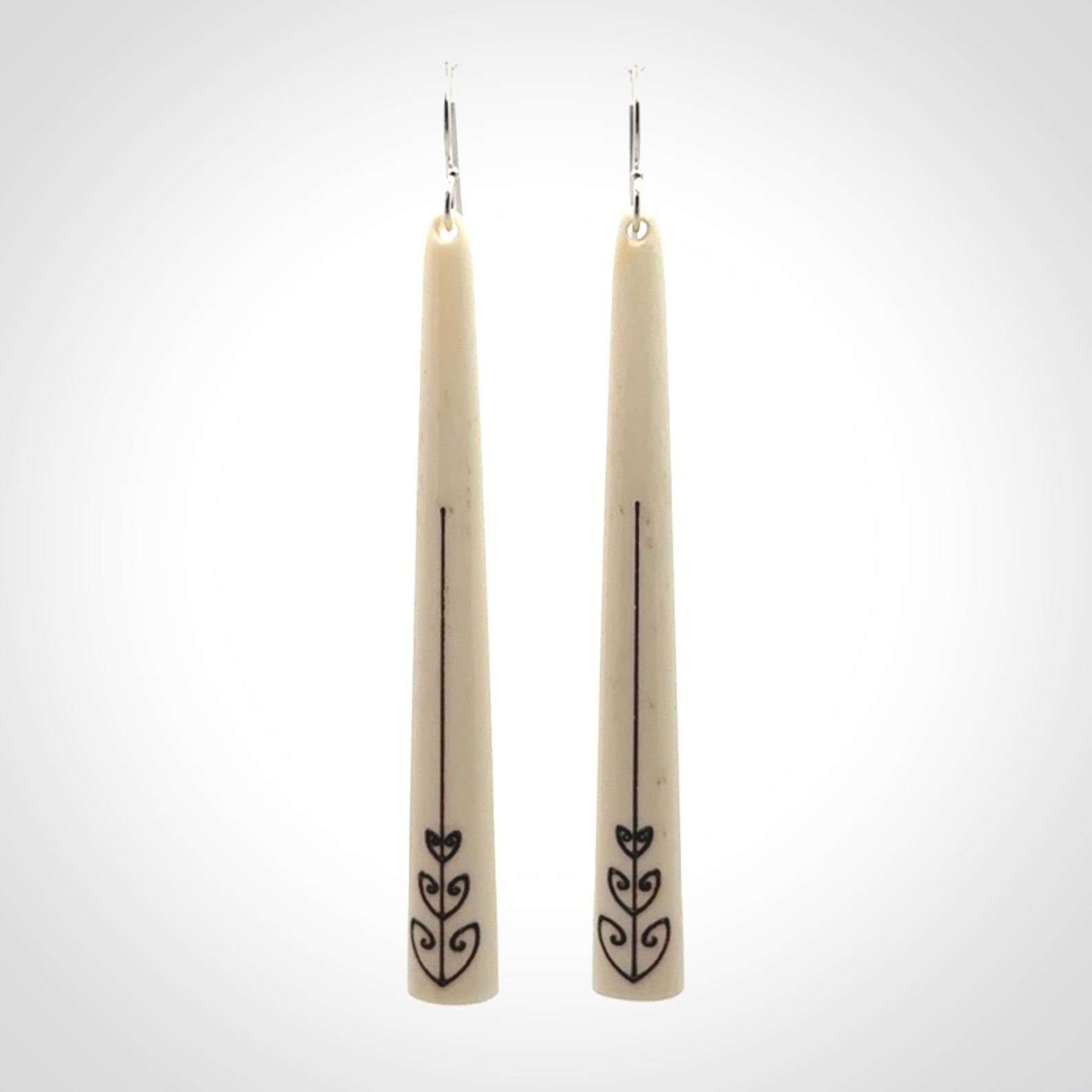 Hand carved bone earrings