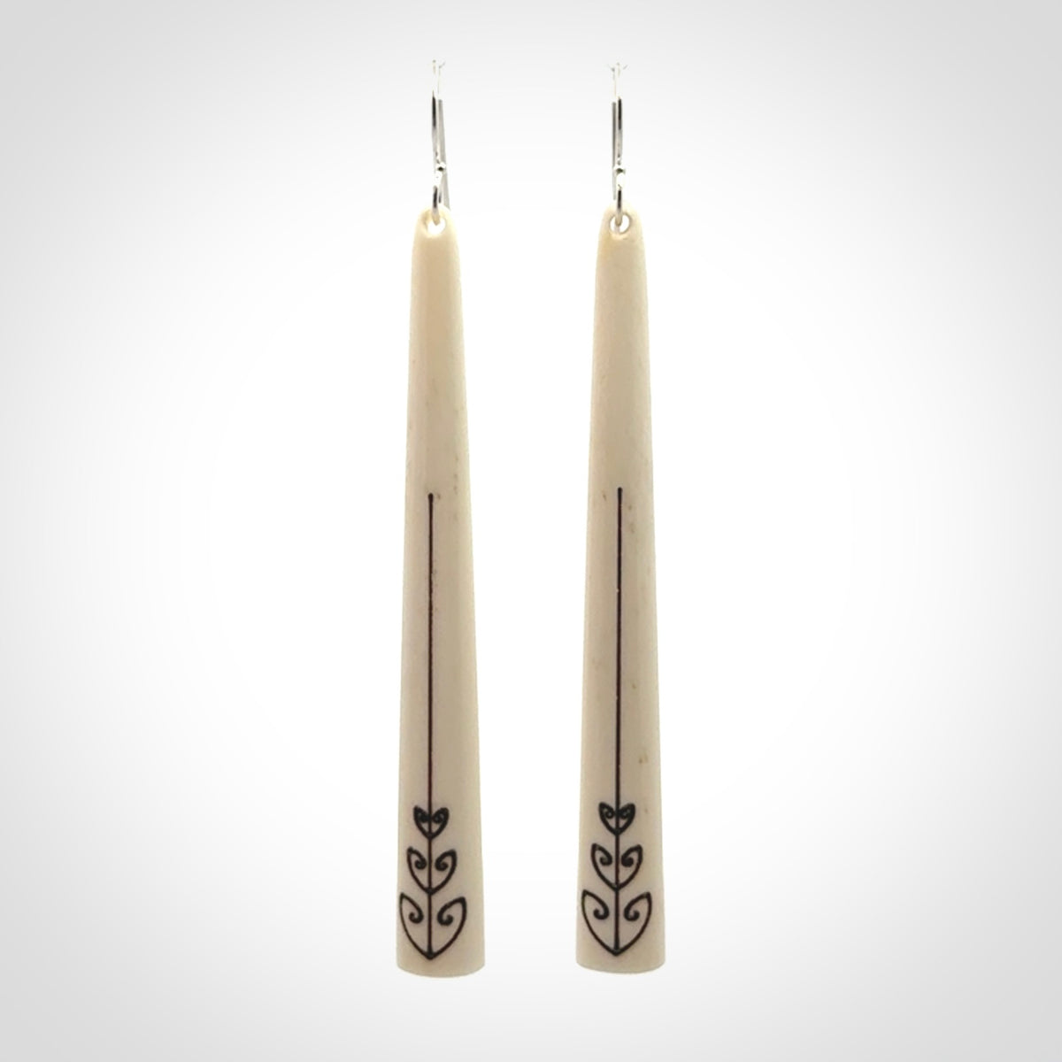 Hand carved bone earrings