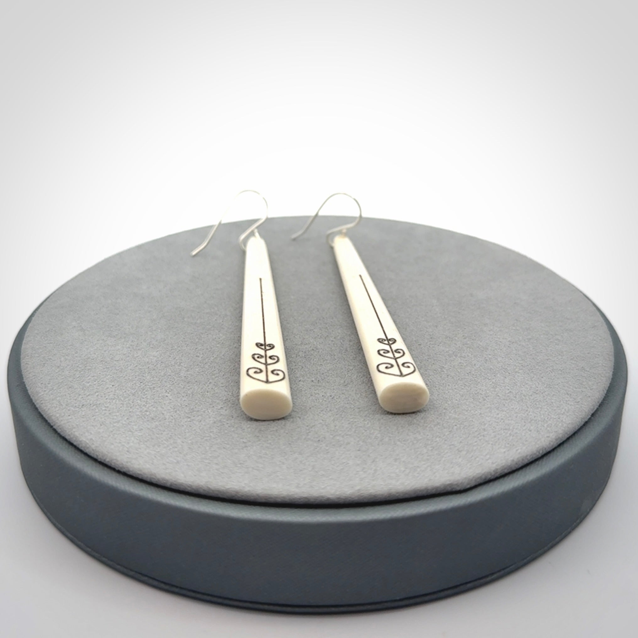 Hand carved bone earrings