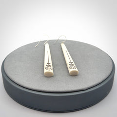 Hand carved bone earrings