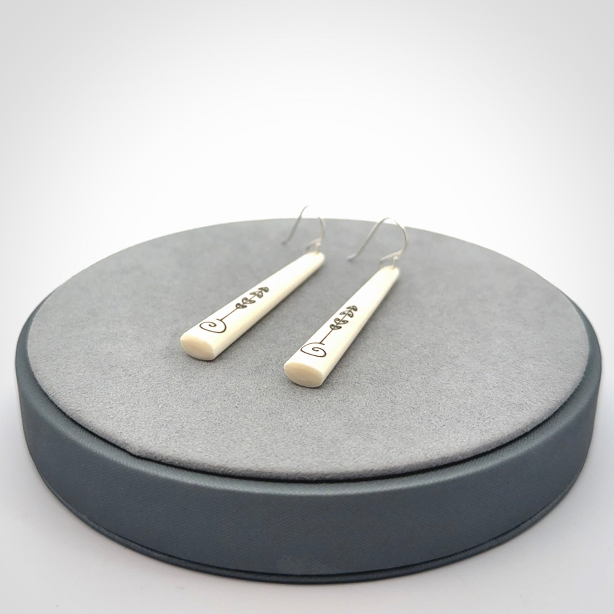 Hand carved bone earrings