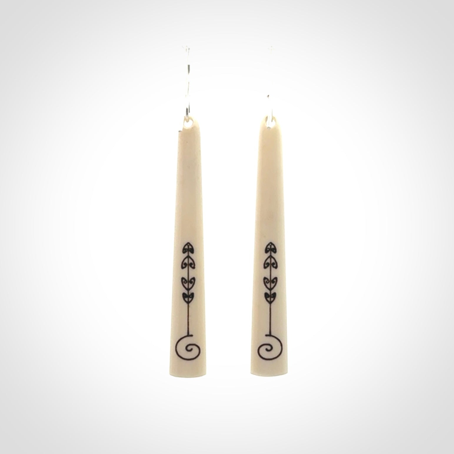 Hand carved bone earrings