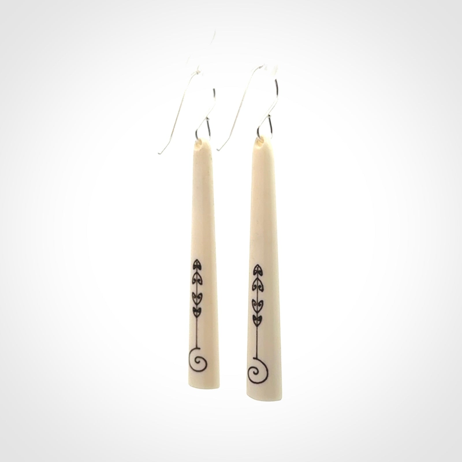 Hand carved bone earrings