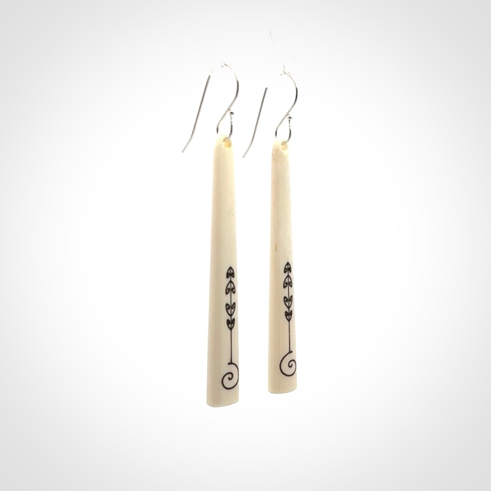 Hand carved bone earrings