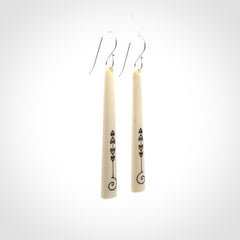 Hand carved bone earrings