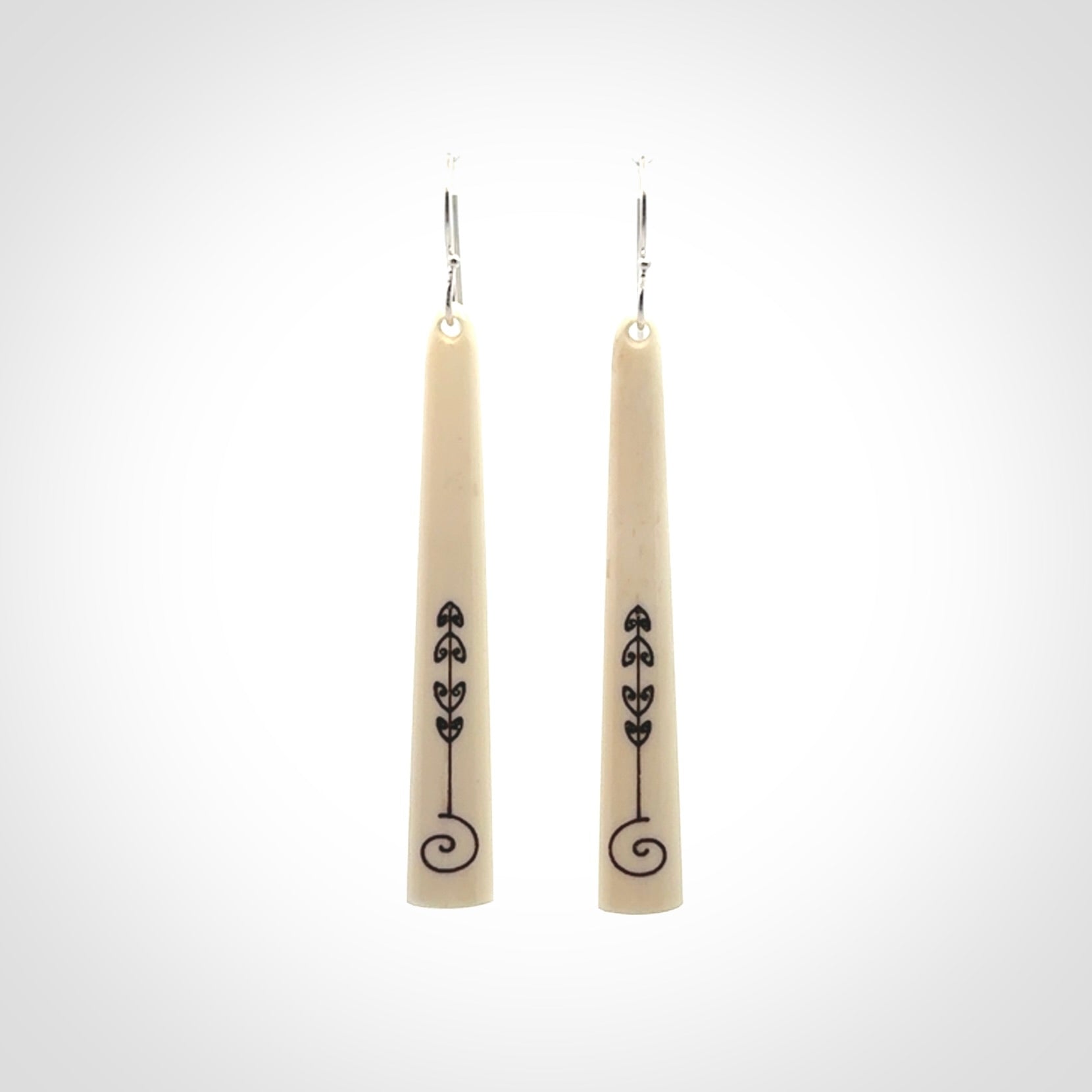 Hand carved bone earrings