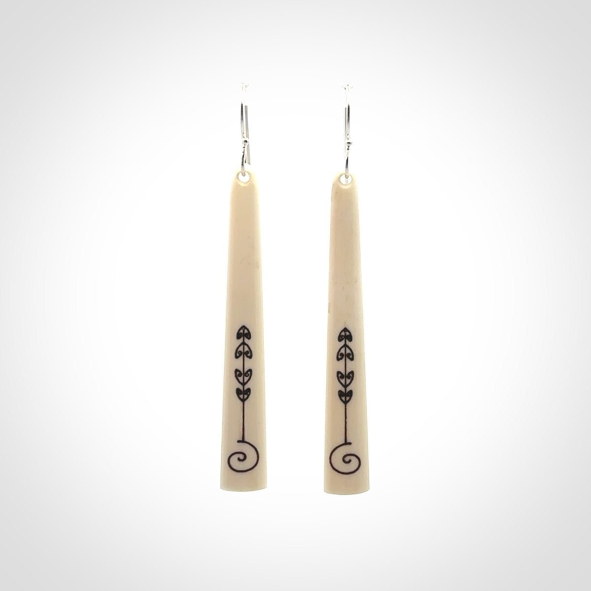 Hand carved bone earrings