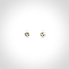 Hand carved small New Zealand Jade and Sterling Silver stud earrings.