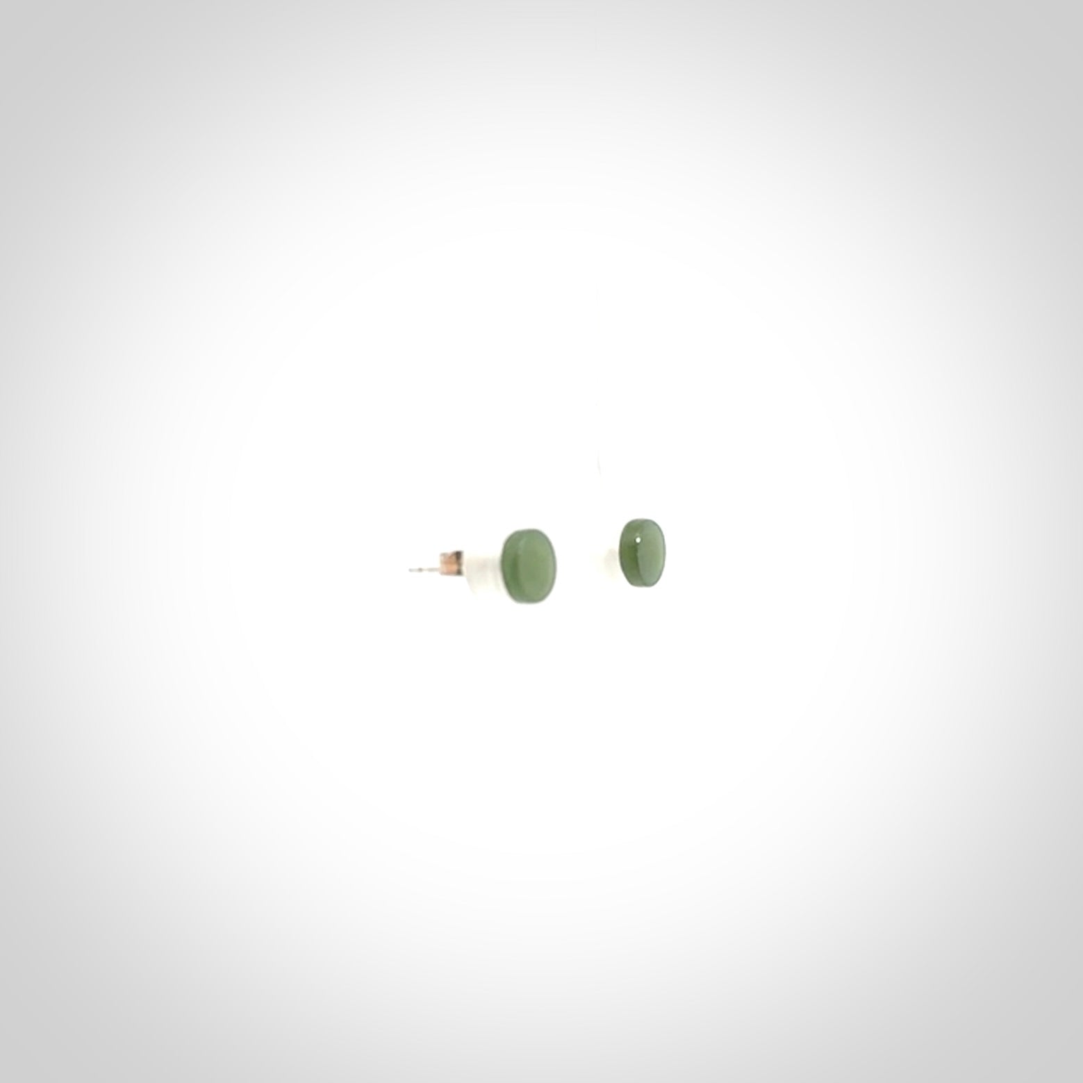 Hand carved small New Zealand Jade and Sterling Silver stud earrings.