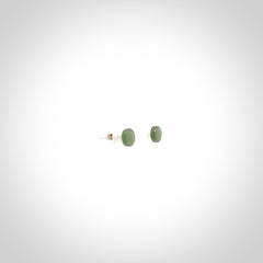 Hand carved small New Zealand Jade and Sterling Silver stud earrings.