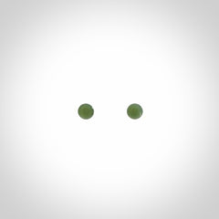 Hand carved small New Zealand Jade and Sterling Silver stud earrings.