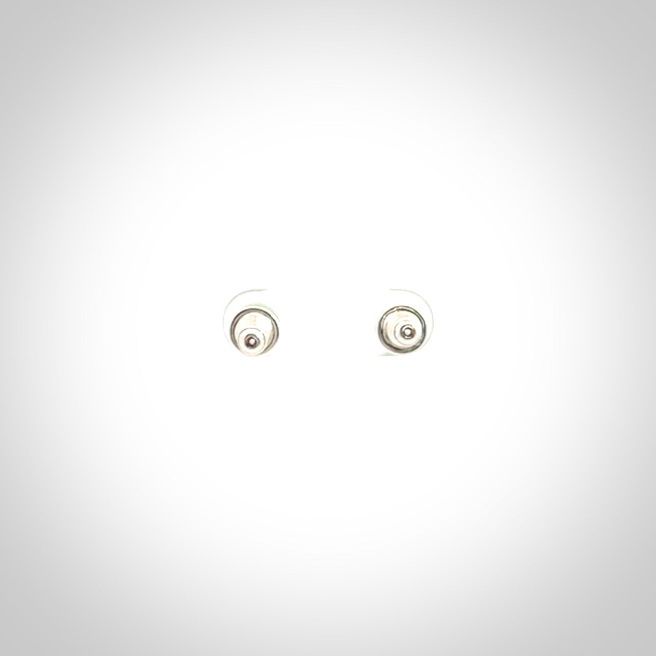 Hand carved small New Zealand Jade and Sterling Silver stud earrings.