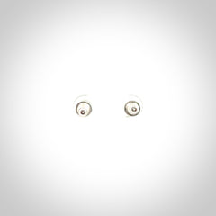 Hand carved small New Zealand Jade and Sterling Silver stud earrings.