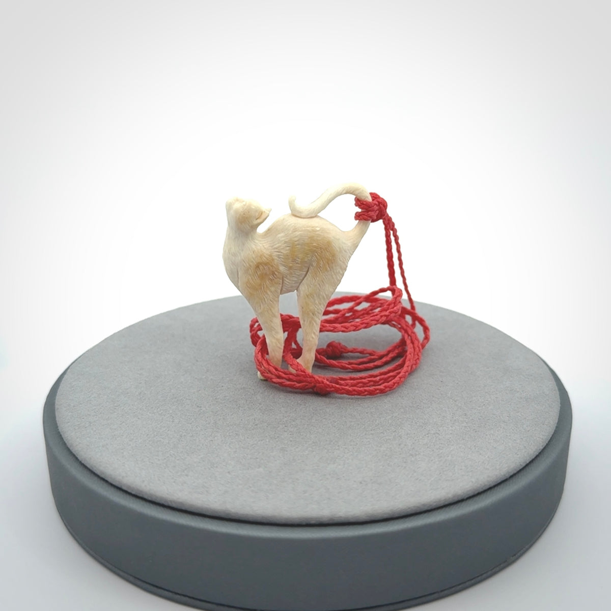 A Charming Stretching Cat Pendant hand made in bone
