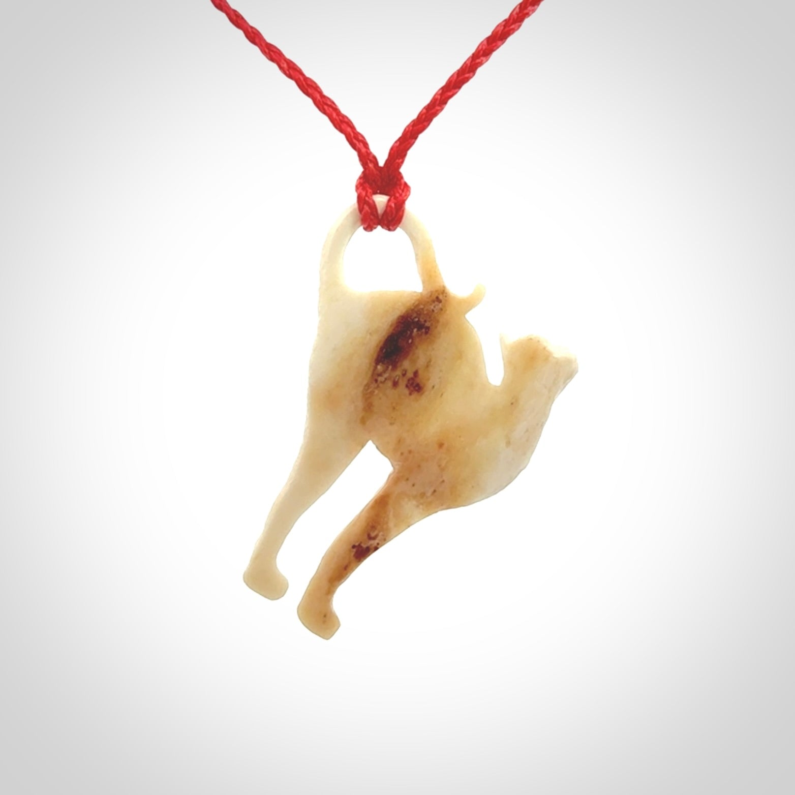 A Charming Stretching Cat Pendant hand made in bone