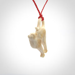 A Charming Stretching Cat Pendant hand made in bone