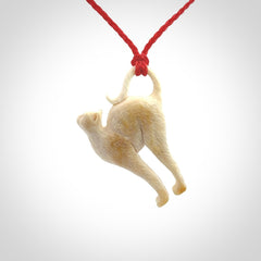 A Charming Stretching Cat Pendant hand made in bone