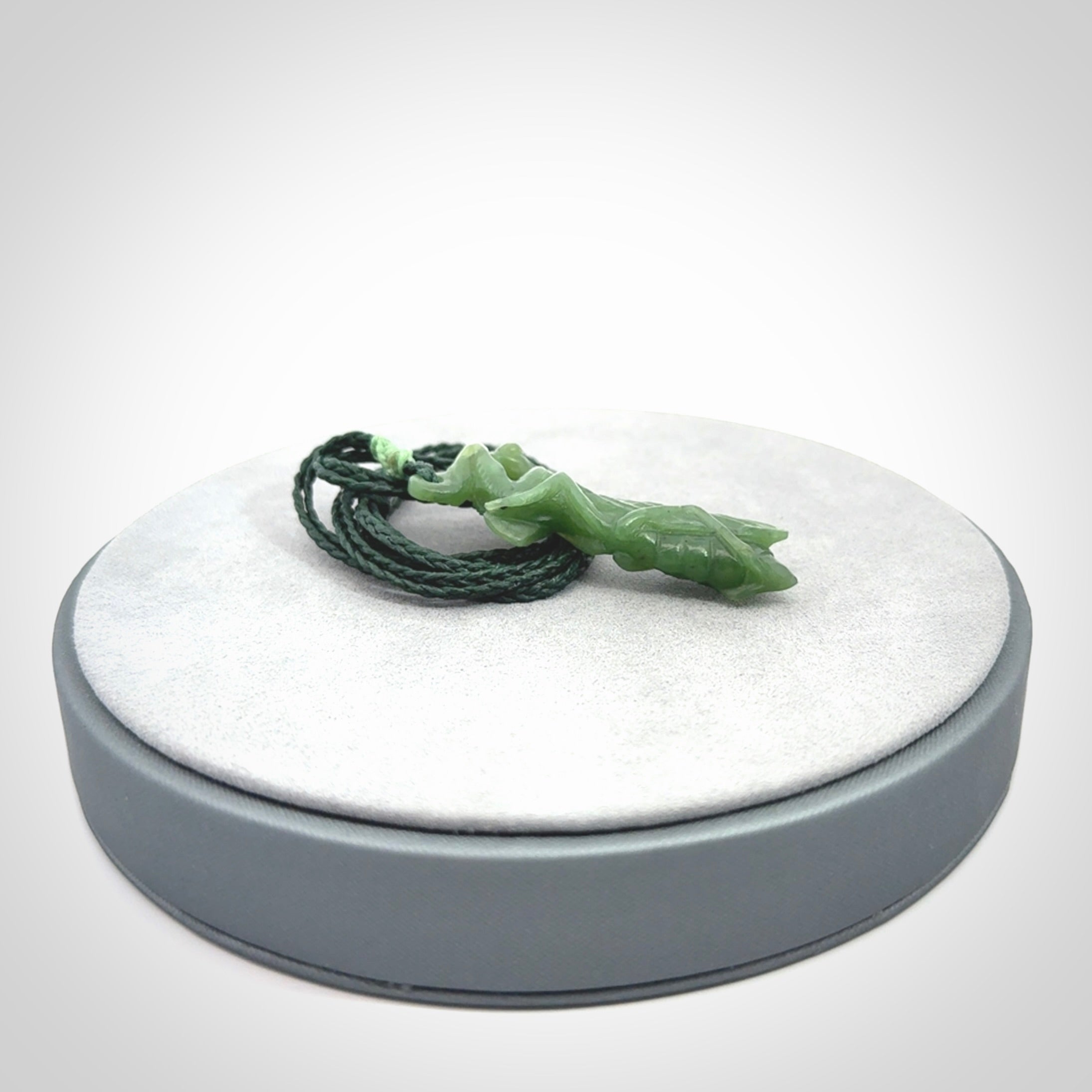 Hand carved Mantis pendant, hand made for us from British Columbian Jade.